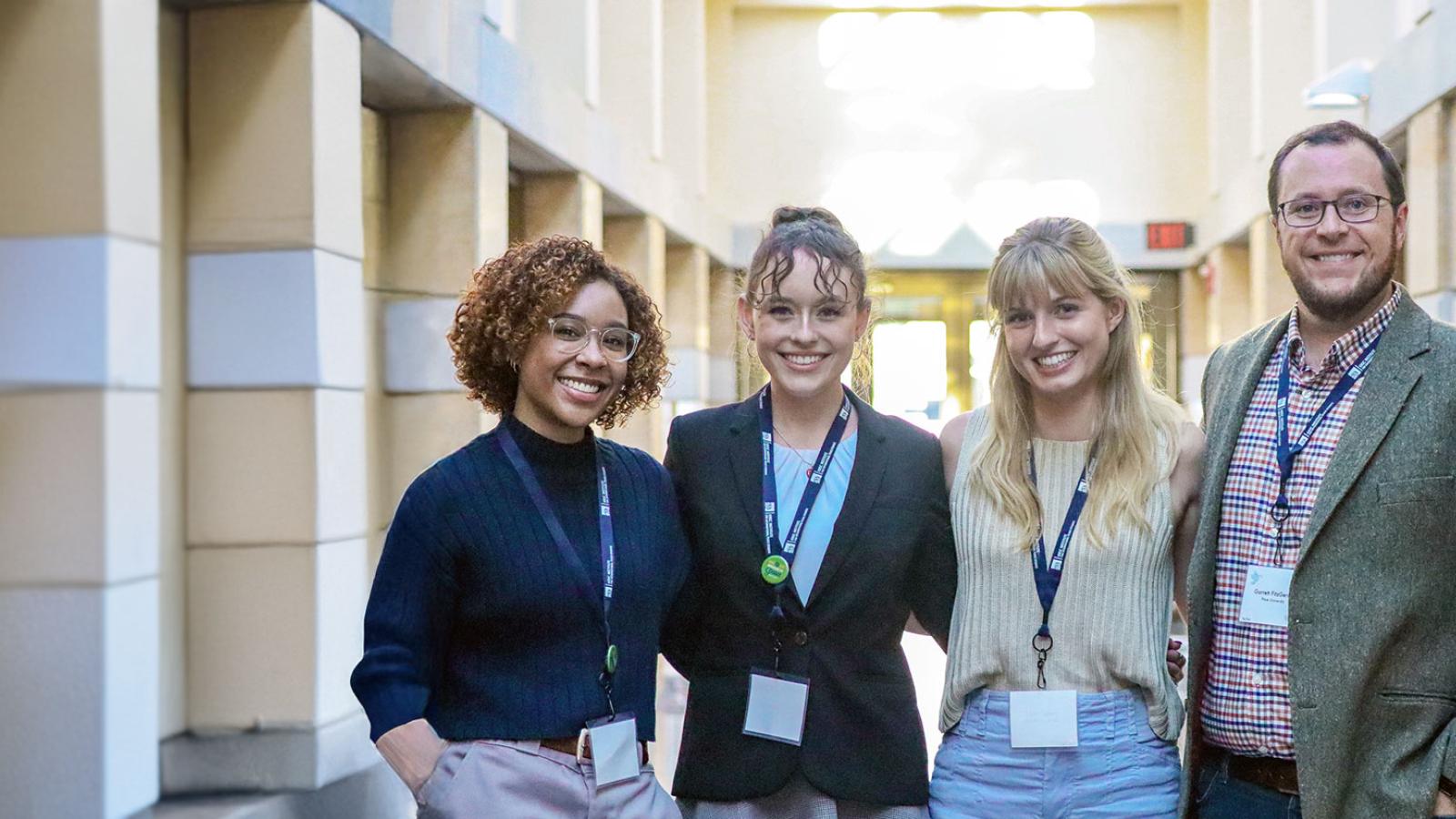 Pace University Peace and Justice Studies students with professor Garrett FitzGerald at a conference
