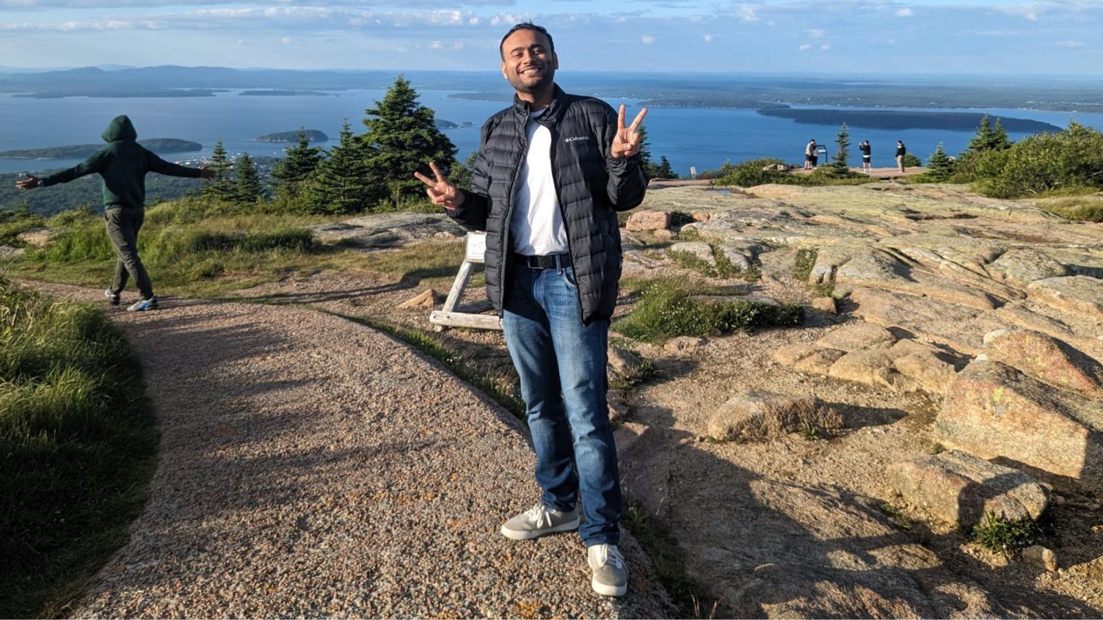 Akshay Nair, student at Pace University's Seidenberg School of CSIS posing for a photo in nature.
