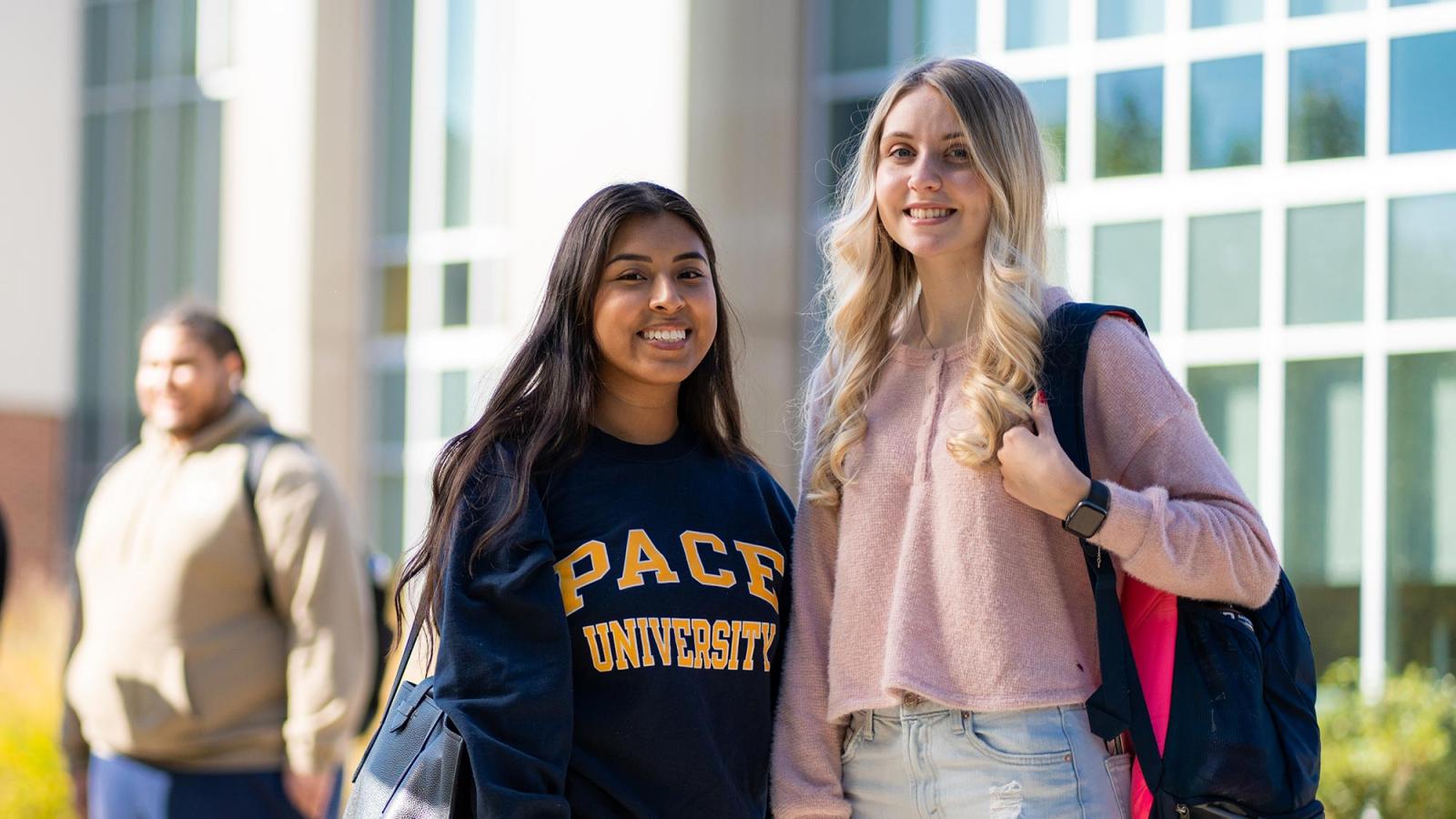 Pace students walking on outside on the Pleasantville Campus