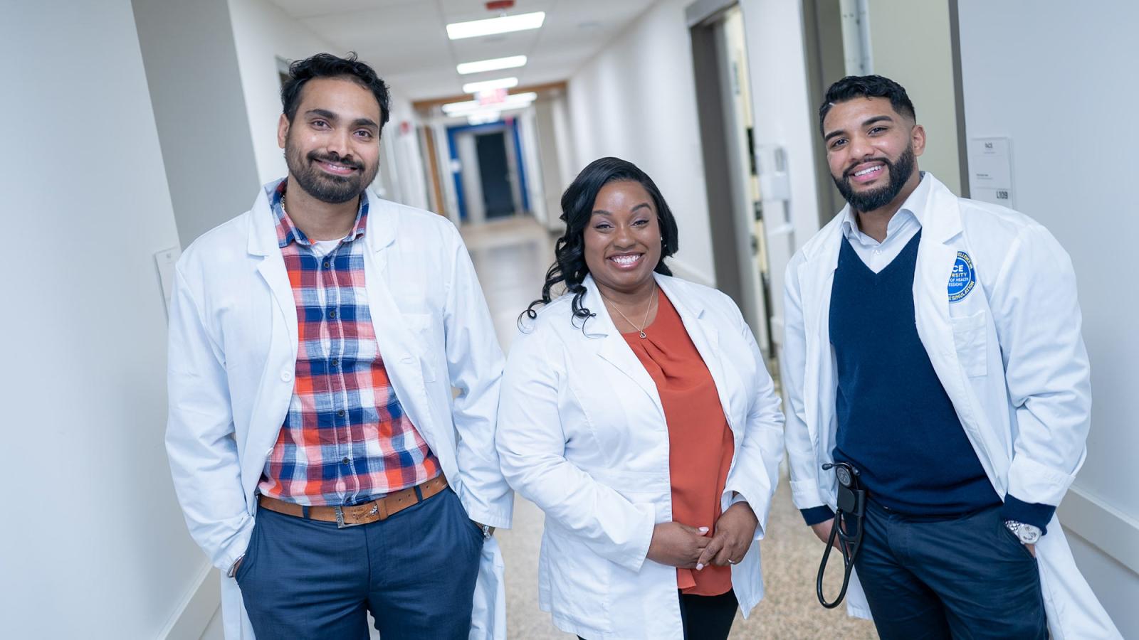 Group of Pace University nursing students smiling at the camera.