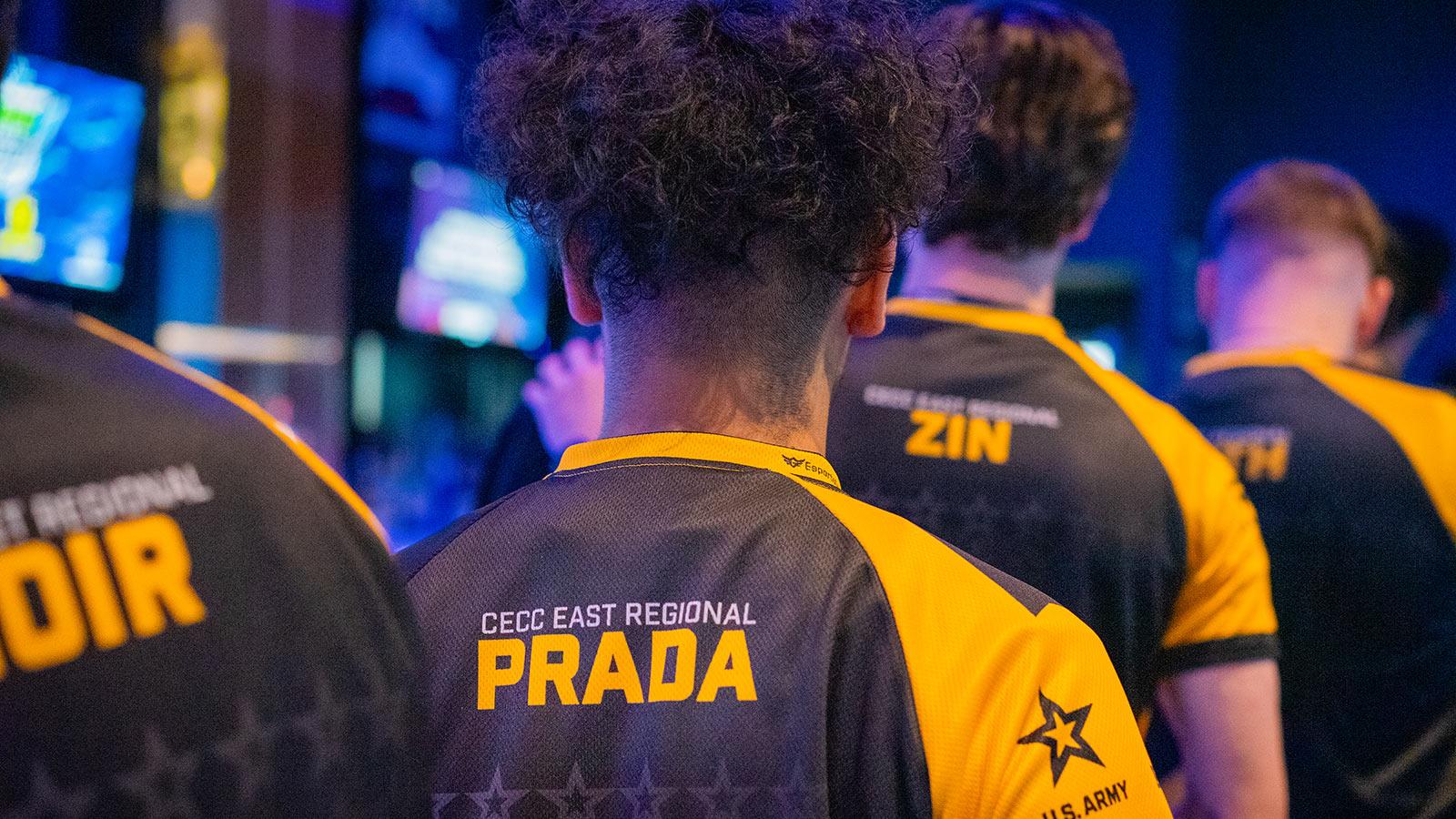 The back of an Esports player's jersey bears the name Prada