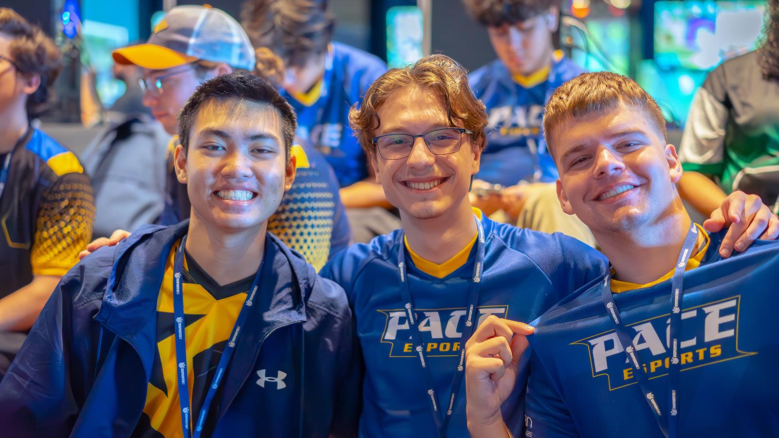 Three Pace Esports players smile 