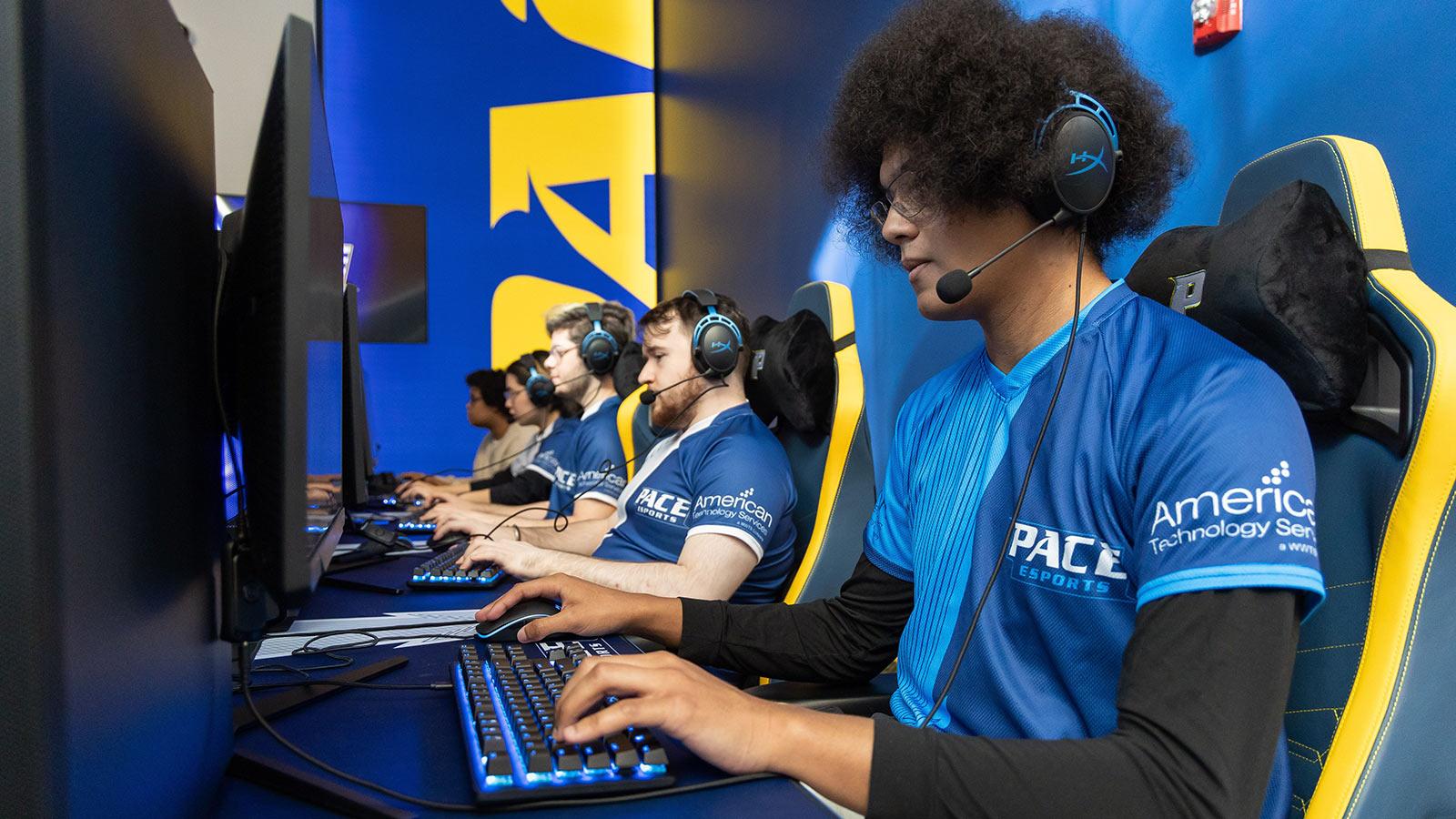 Pace Esports players use the gaming stations at the NYC arena