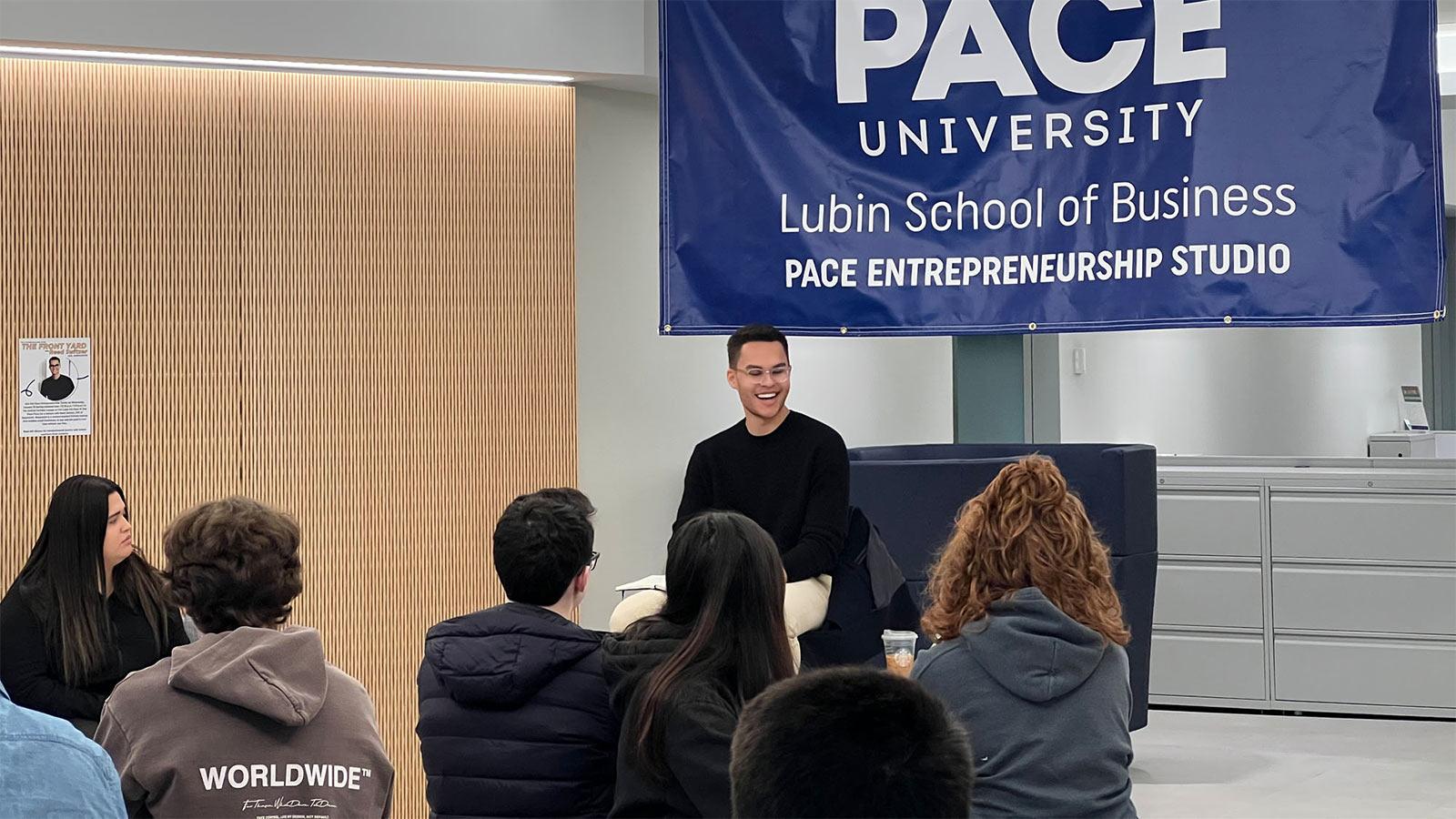 male guest speaker talking to students in the Pace Entrepreneurship Studio on the New York City Campus