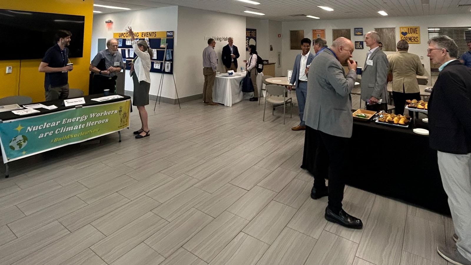 2024 Renewable Energy Conference exhibitor tables: Cuddy & Feder LLP, Nuclear New York, and the New York Power Authority