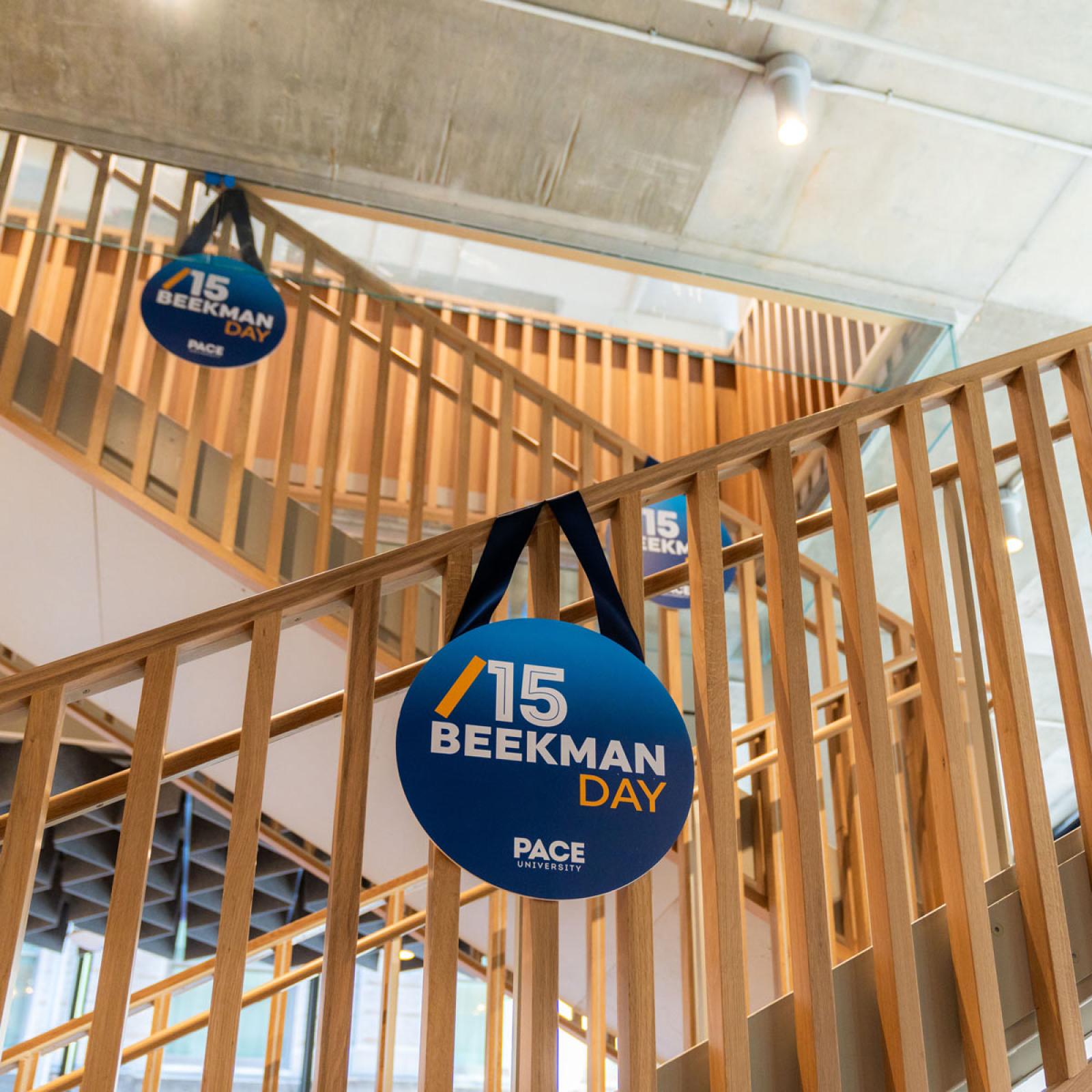 the center staircase in 15 Beekman decorated for the ribbon-cutting 