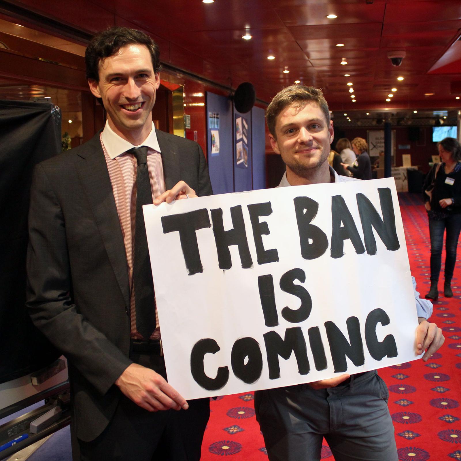 Pace University's faculty member Matthew Bolton, PhD, and Daniel Högsta, Deputy Director of ICAN holding a sign stating "The Ban is Coming"