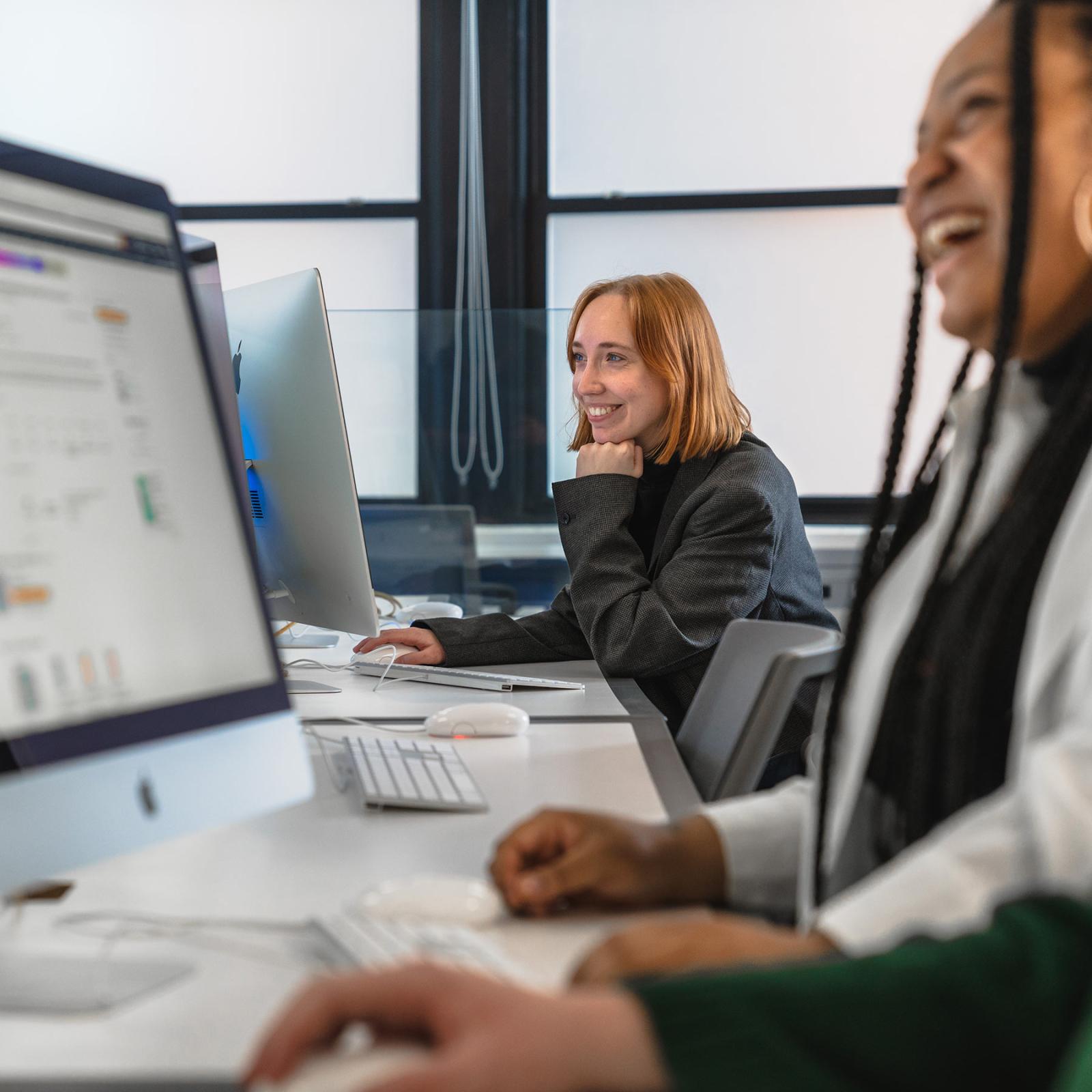 Pace University students learning in a computer lab