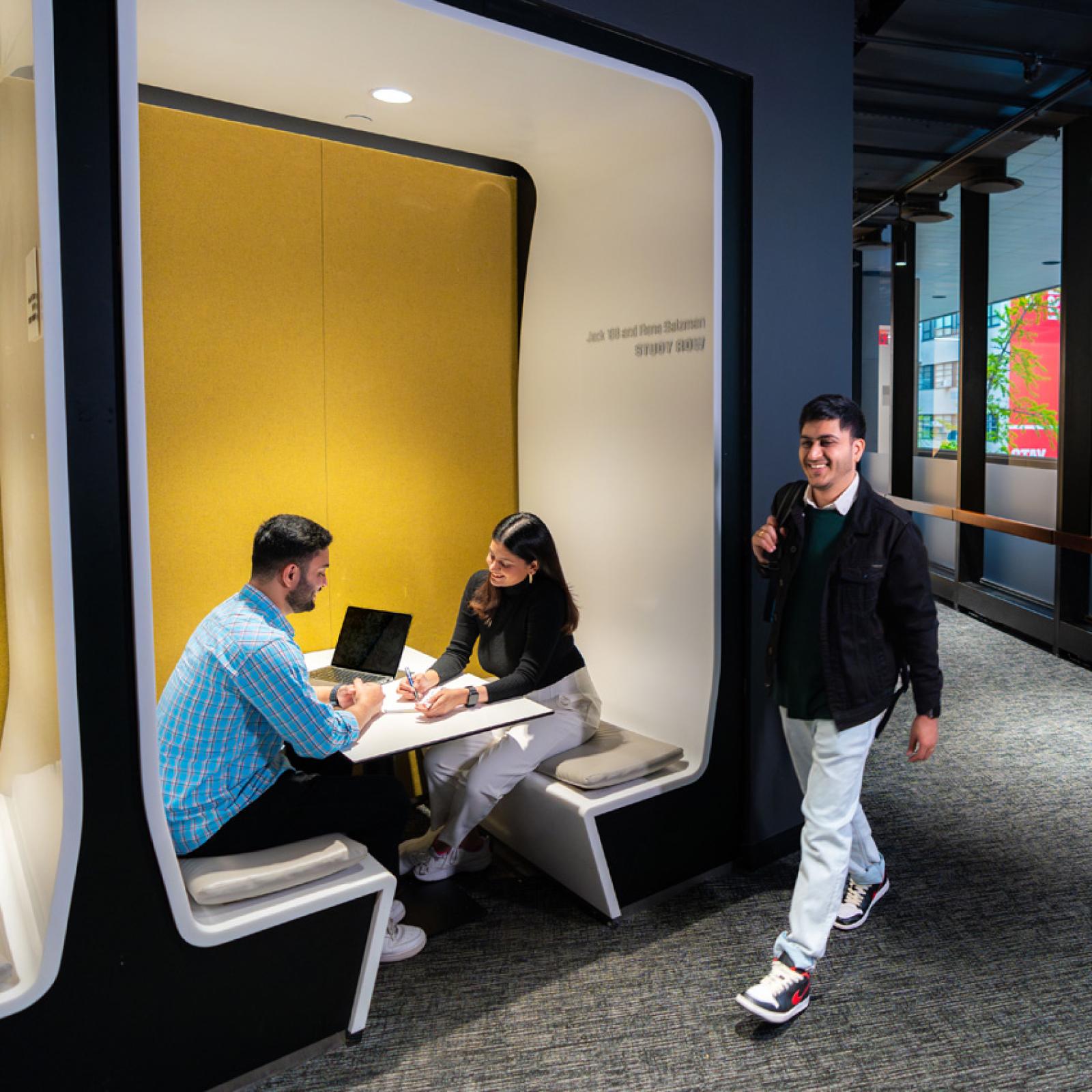 Students working at a study nook on Pace University's NYC campus.