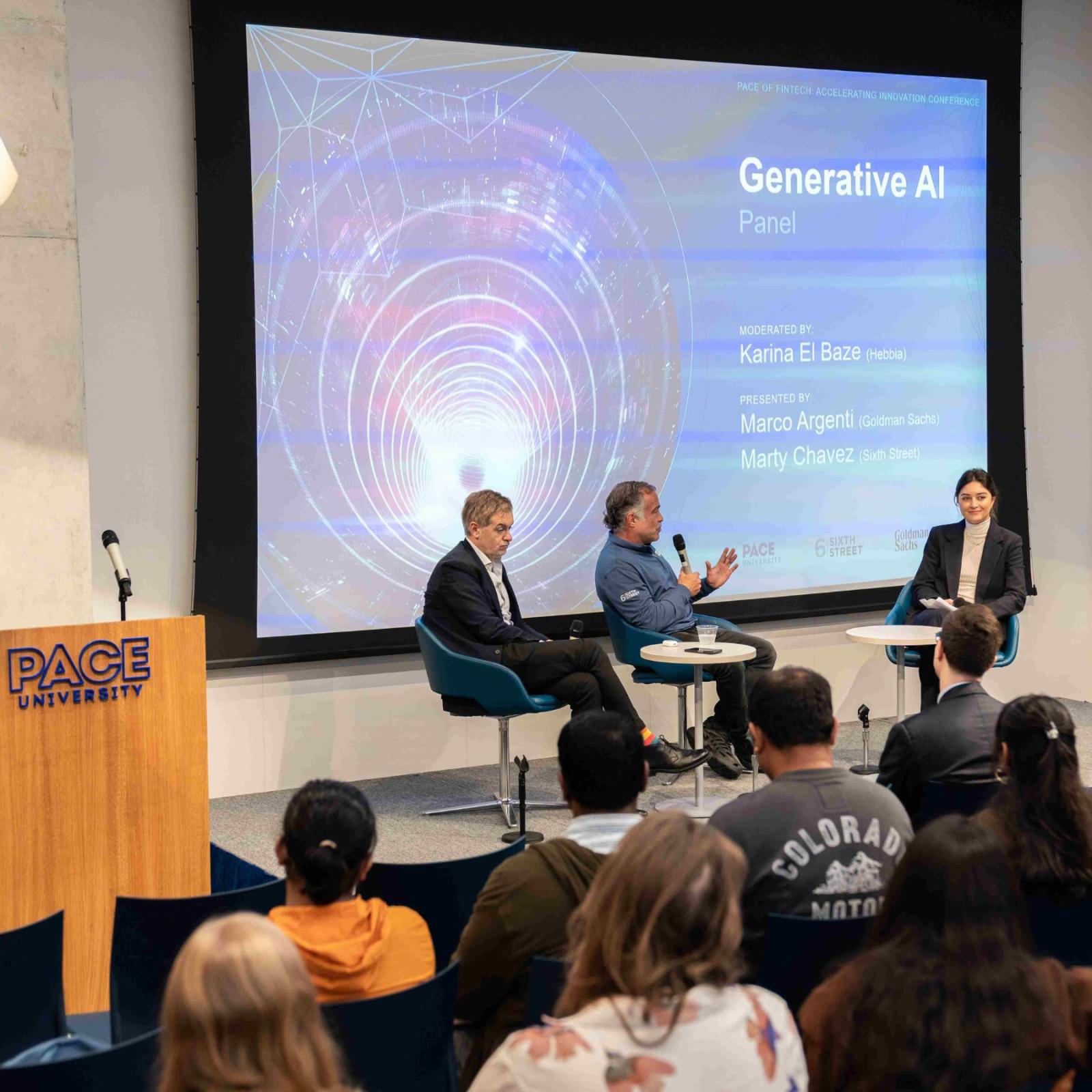 Pace students in attendance of a Fintech Conference held in Pace's 15 Beekman building, with industry professionals holding a discussion on stage about Generative AI.